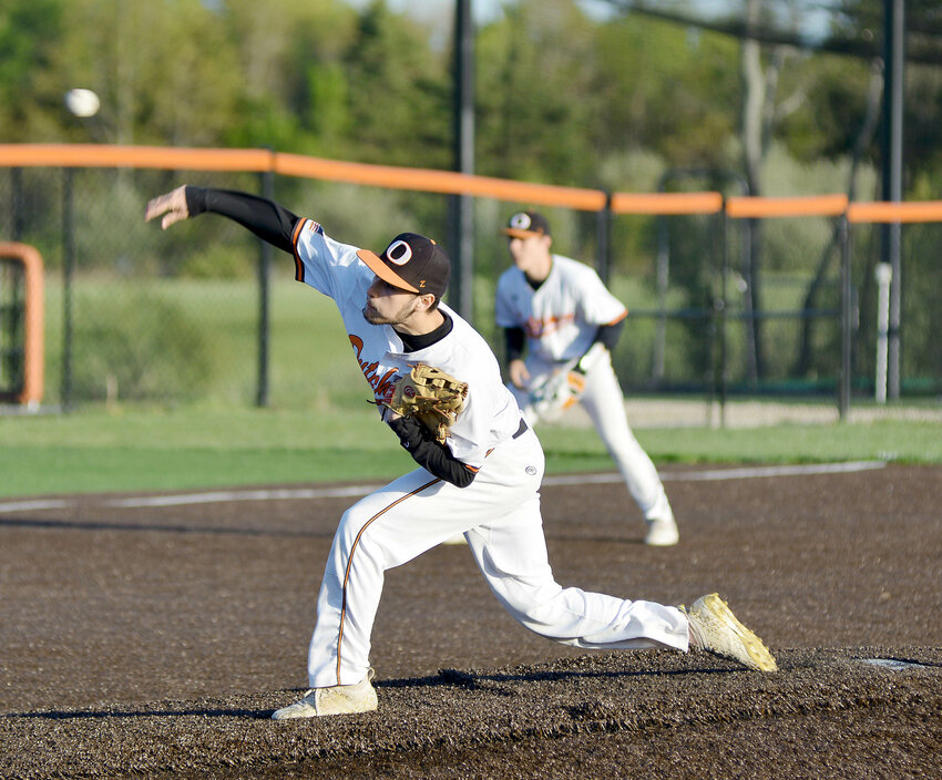 JJ Brown (center) delivers one of his 73 pitches for Owensville&rsquo;s Dutchmen during senior-night baseball action last Tuesday at OHS Field against Vienna&rsquo;s Eagles. Brown helped the Dutchmen score a road victory Monday night by a 10-7 final score in Steelville. Hosting Cuba last night (Tuesday), OHS closes their regular season tomorrow (Thursday) at Waynesville before opening district play Saturday.