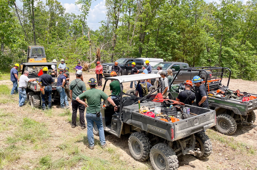 About 25 people from the Missouri Department of Conservation, the Vichy Volunteer Fire Department and the nonprofit organization Quail Forever gathered at the Spring Creek Gap Conservation Area for three days last month to participate in training about how to safely handle tree debris. Several of the area&rsquo;s trails were closed following the April 15 tornadoes.