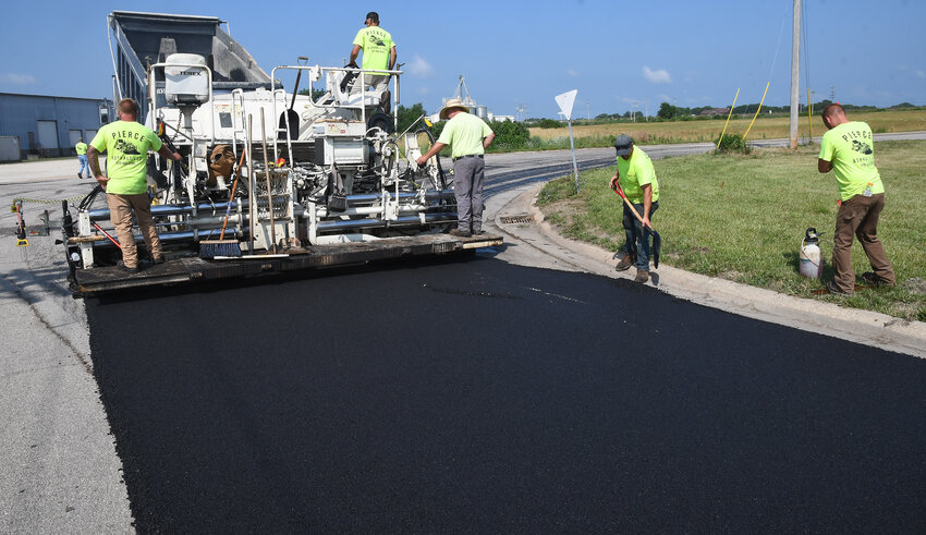 Owensville&rsquo;s summer paving project is in full progress this week. Paving began last week with parking lots at Memorial Park and continued Monday on the west end with L&amp;D Drive and Roller Drive (above). Pierce Asphalt won the city bid. Work was continuing Tuesday on streets surrounding a water line extension project the length of Sixth Street and connecting back to Highway 28 at Fifth.