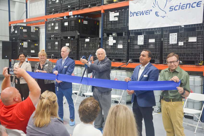 Brewer Science founder and Executive Chairman Dr. Terry Brewer prepares to cut the ribbon for the company&rsquo;s new expansion to its Vichy manufacturing center at a ceremony on Aug. 15.