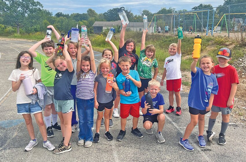 BES students on Sept. 22 walked more than 3,000 laps to raise money for technology. Students asked family and friends to sponsor them with a flat rate or donation per lap. Grades K-4 walked more than 3,000 laps throughout the day.