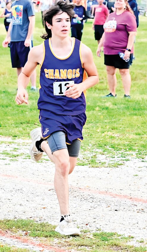 Levi Weed sets a good pace in the junior high race at last Wednesday&rsquo;s Show-Me Conference cross-country meet at Fatima.