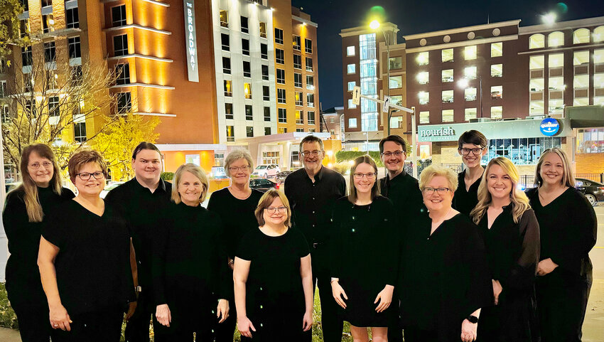 The Columbia Handbell Ensemble is pictured on Broadway in downtown Columbia.