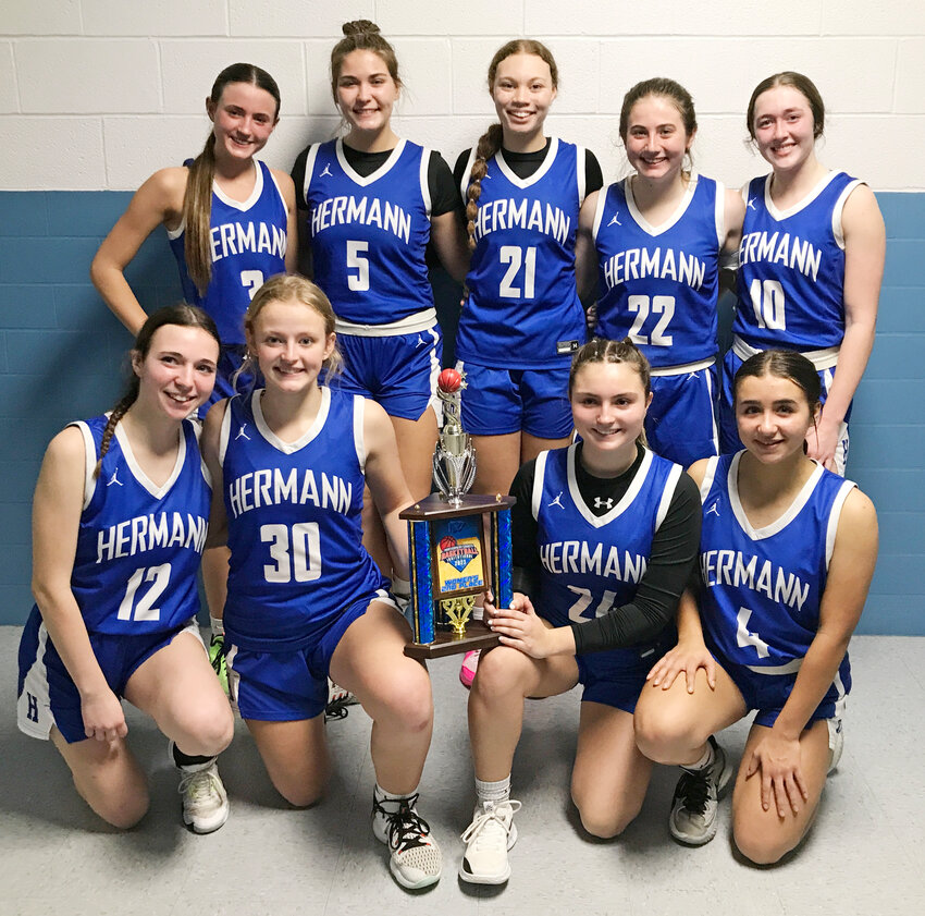 andy Emmons&rsquo; Hermann Lady Bearcats gathered for a team photo with the second-place trophy from the Montgomery County Girls Basketball Tournament following their 72-49 title game loss to the Lady Wildcats.