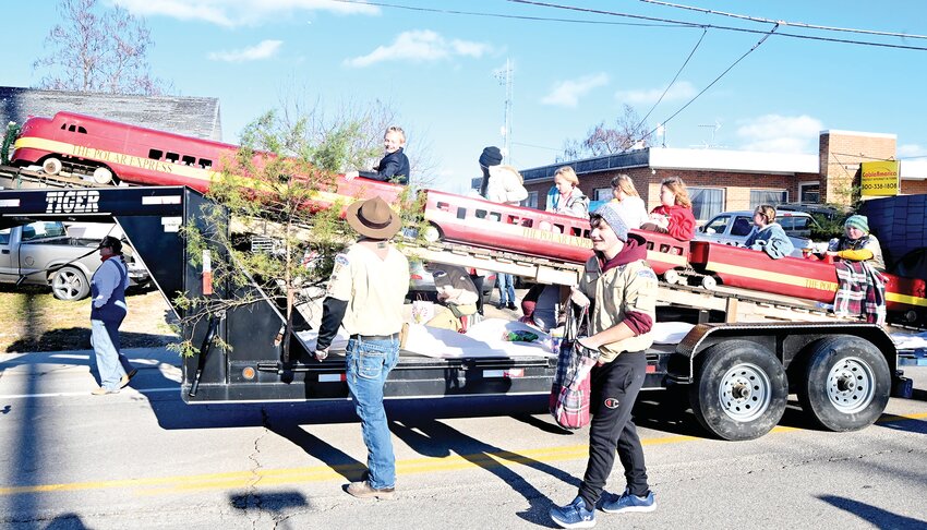 Linn Scout Troop 17 earned first place in the Linn Christmas on Main Street parade on Saturday.