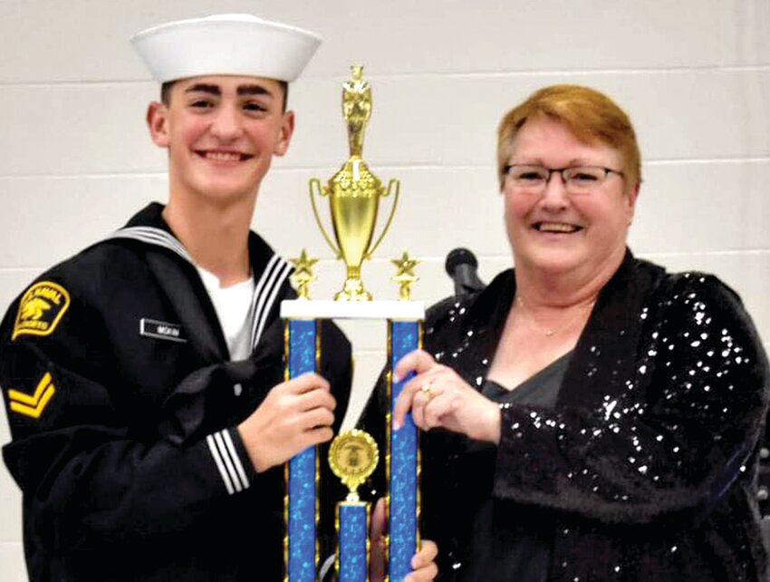 Lane McKim, 14, of Linn, recently earned Cadet of the Year honors from the U.S. Naval Sea Cadet Corps. Thomas Jefferson Division Commanding Officer Lt. Regina Hall presented the award.