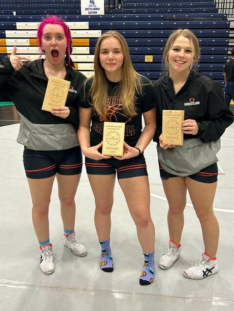 Jv Dutchgirl wrestlers earning plaques for their top-eight finishes during Thursday’s Wonder Woman JV Wrestling Tournament at Battle High School in Columbia (above, from left) were Merrick Blankenship, Rylee Dare and Kylie Bates. OHS wrestling competed last night (Tuesday) in a quad meet at Southern Boone.