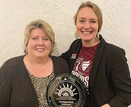 Tarey Vieth (left) was the recipient of the Hermann Chamber of Commerce Distinguished Educator Award at the Gerald Engemann Memorial Awards Banquet. St. George Principal Amy Schebaum (right) said &ldquo;Mrs Vieth&rsquo;s impact on our school and community goes far beyond the classroom. Her dedication, passion, and tireless efforts have made her a pillar of inspiration for us all. On behalf of the Hermann community and St. George School, we extend our deepest gratitude for her outstanding contribution.&rdquo; Photos of the other Hermann Chamber of Commerce award recipients where not available at press time and will run next week.