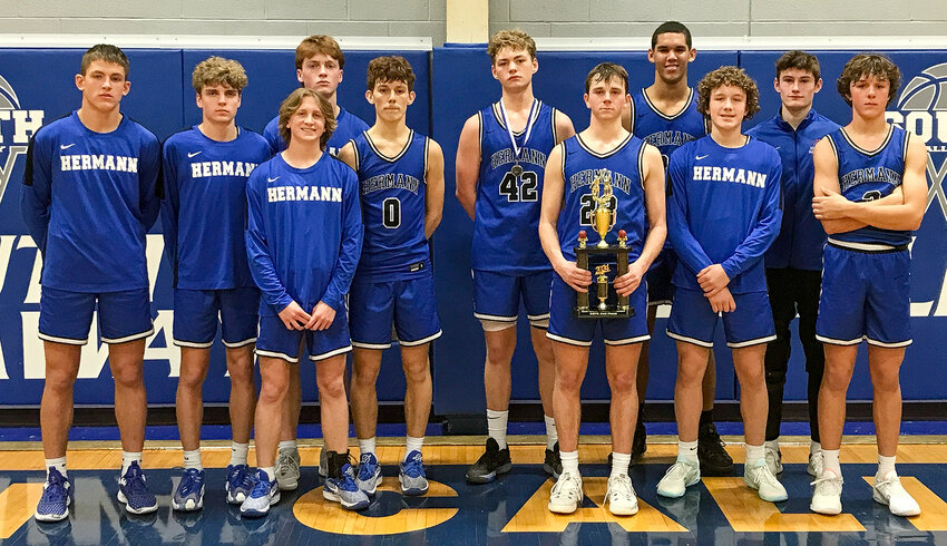 hermann&rsquo;s bearcats (above) gather for a team photo with the second-place trophy from the South Callaway Tournament following their 47-43 loss to Montgomery County.