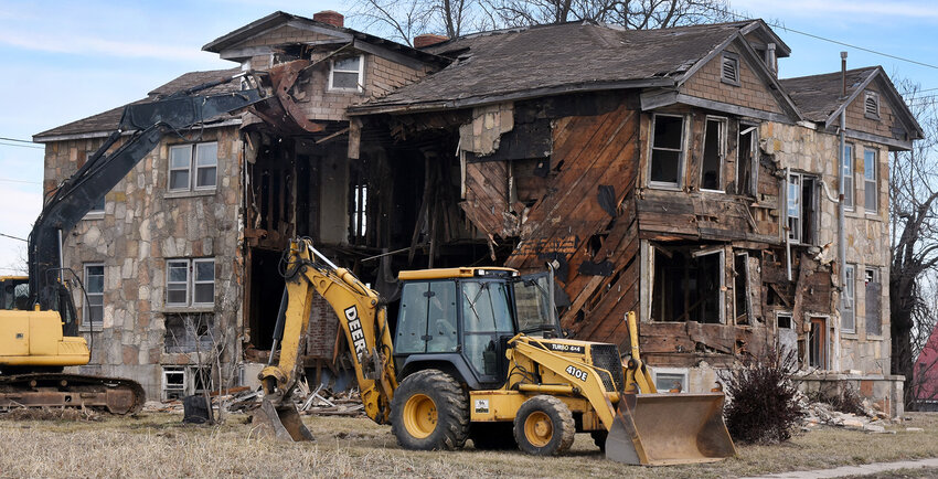 Heintz Excavating began demolition Thursday on the old hotel and boarding house in Bland which had ties to the Rock Island rail line. Work was completed Friday.