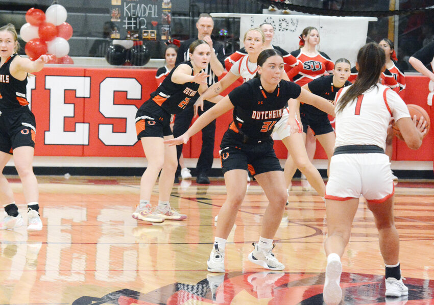 Audrey Quilacio (center) meets St. James&rsquo; Emily Recker at half court during Owensville&rsquo;s 38-32 road win. Other Dutchgirls keeping an eye on the ball (from left) include Camryn Caldwell, Anya Binkhoelter and Emma Daniels. OHS will end their regular season tomorrow (Thursday) night hosting North County&rsquo;s Lady Raiders at 6 p.m.