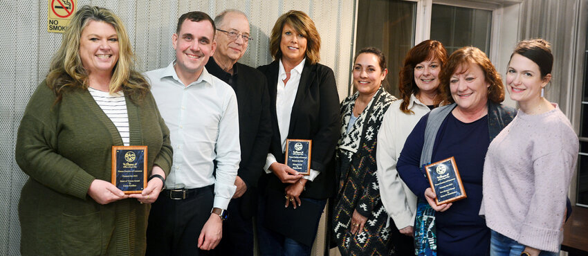 Vienna Chamber of Commerce President Preston Hodapp (second from left) poses with Heart of Vienna Award winner Carrie Kleffner and representatives from award-winning businesses Phelps Health and Route 63 Distributing.