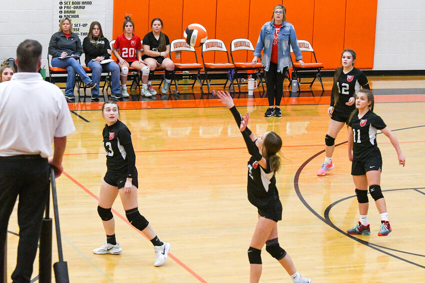 Bland Lady Bear volleyball team members (from left) keeping their eyes on the ball include Makenna Lange, Hayden Fann and Natalie Lansford.