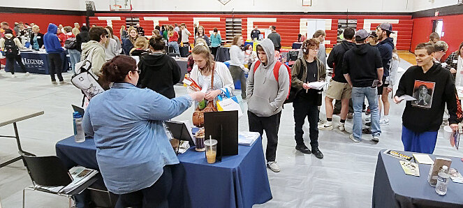 Belle High School juniors and seniors were the first group to attend the March 22 career and job fair in the big gym. Students received free items from about 25 tables as they listened to business representatives share training opportunities and job openings in the area. Sophomores and freshmen visited the group later in the afternoon and Vienna High School students were bussed in to attend the event. Business representatives were pleased to be invited and visited with some of their current employees as students asked questions and collected business cards.