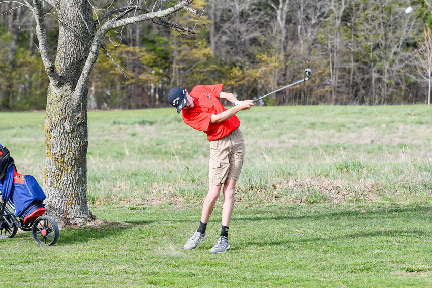 Avery Craigmiles hits his approach shot at Pine Ridge Golf Course during Monday&rsquo;s Belle Invitational Golf Tournament.
