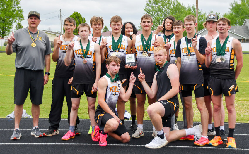 Vienna Eagle track and field team members gather for a picture with the Gasconade Valley Conference (GVC) championship plaque after topping the team standings with 169 points. Vienna will look to add a district plaque to their hardware haul this Saturday during the MSHSAA Class 2, District 4 Track Meet at Glasgow High School.