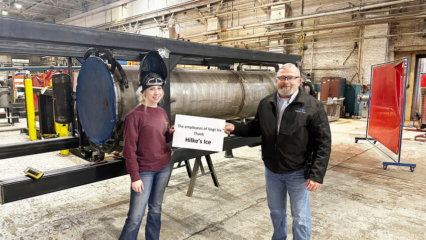 Welder Kirsten Know (left) did all the welding on the new Vogt Ice machine, pictured with Rick Dollar, both of Vogt Ice.