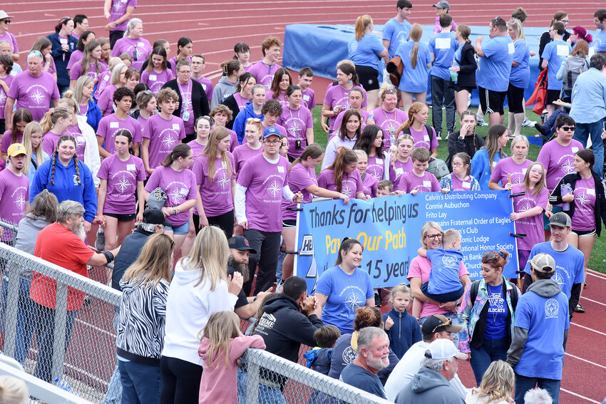 Gasconade County R-1 School District students in the special services program and students and staff assisting them parade Friday morning on their home football field to help open the 15th annual Special Olympics track and field meet they were hosting for 17 area school districts.