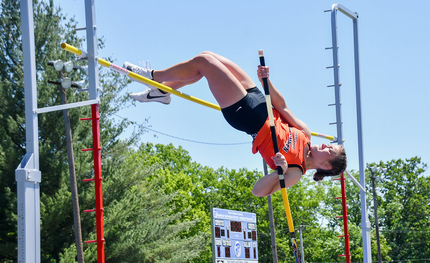 Ruvia Nowack looks to contort her body over the par in the girls pole vault during MSHSAA Class 3 sectional track meet action Saturday at Paris High School.