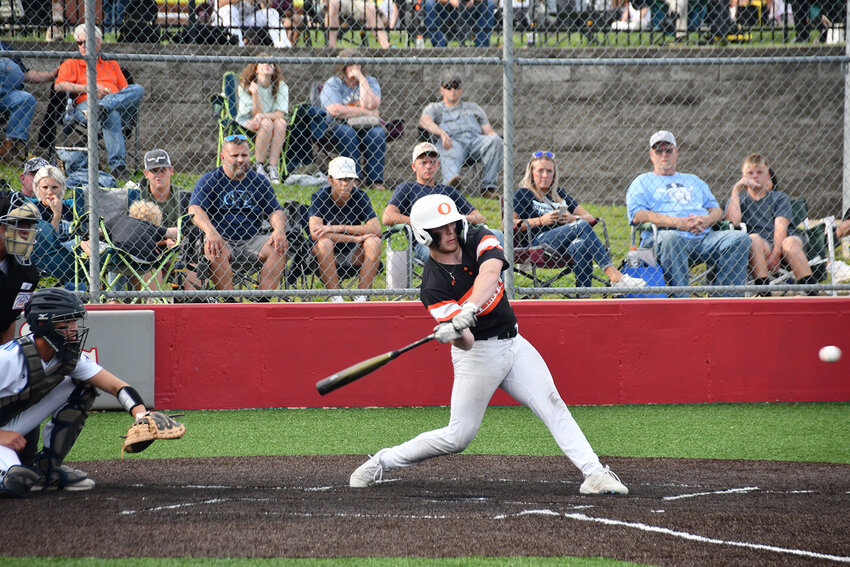 Landon Kramme takes a swing at a pitch for Owensville’s Dutchmen during MSHSAA Class 4, District 4 Tournament baseball action at St. Clair High School.