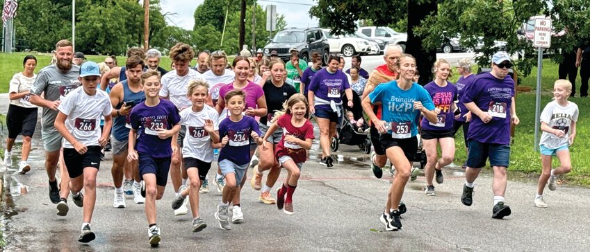 Everyone took off quickly to start Saturday’s. eighth annual 5K Run/Walk to benefit Rescue Innocence.