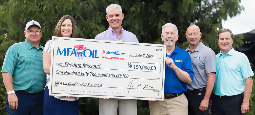 MFA Oil Company presented Feeding Missouri with a $150,000 donation to combat hunger. Pictured from left, are James Greer, MFA Oil senior vice president, Heather Hargrove, Feeding Missouri executive director, Jon Ihler, MFA Oil president and CEO, Chris Baker, Feeding Missouri resource development manager, Kenny Steeves, senior VP of MFA Oil operations; and Jeff Raetz, MFA Oil chief financial officer.