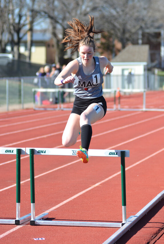 Kiera Finn clears a hurdle during the women&rsquo;s 400-meter hurdles at a track meet on the University of Missouri - Science and Technology (S&amp;T) campus in Rolla during the spring of 2023 for Mineral Area College.